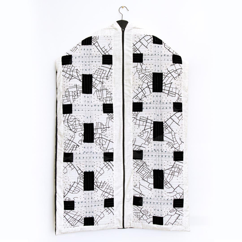 Capsules Lower the Volume Product Inspiration Garmet Bag 1